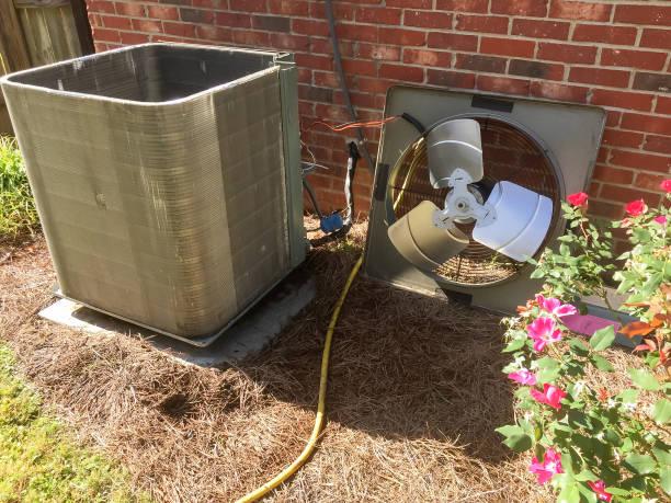 istock Air Conditioner Maintenance on condenser unit 1223305793