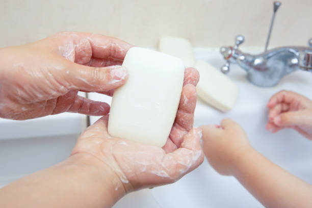 istock clean children's hands in soap wash in water 1223308443