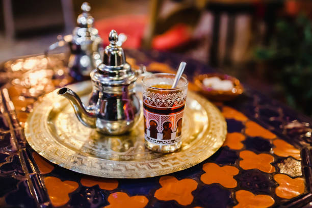 istock traditional Arabic tea cup, arab people drinking tea in Ramadan 1223315930