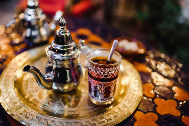 istock traditional Arabic tea cup, arab people drinking tea in Ramadan 1223316014