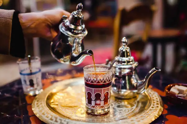 traditional Arabic tea cup, arab people drinking tea in Ramadan