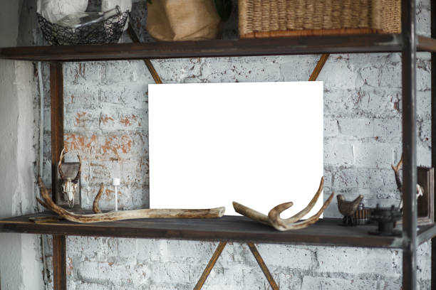 istock White isolated posters with frame mockup in in wall 1223318809