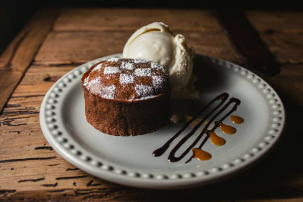 istock chocolate flowing or melting Melting delicious pudding and ice cream 1223319650