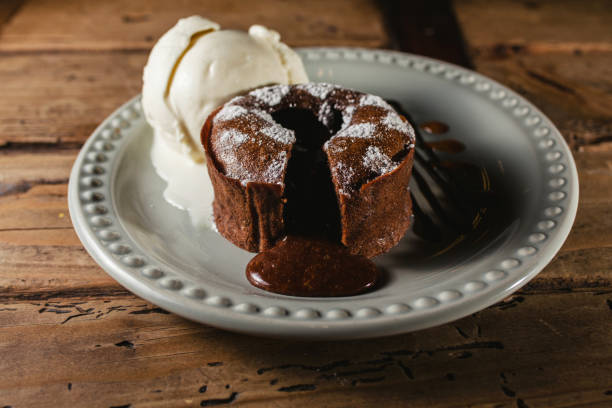 istock chocolate flowing or melting Melting delicious pudding and ice cream 1223319662