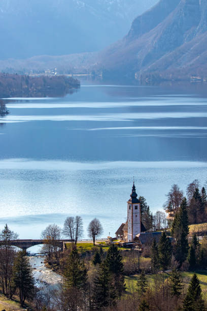 istock Bohinj lake with church and bridge 1223322666