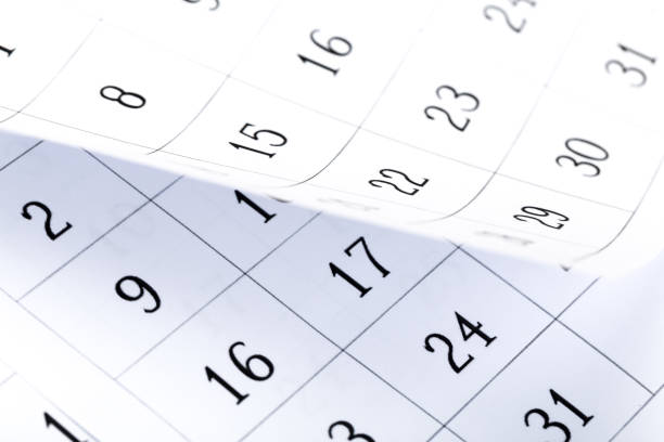 istock Closes a calendar page in blue. flipping calendar 1223323052