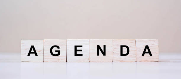istock AGENDA cube blocks on table background. Management and Business concept 1223324552