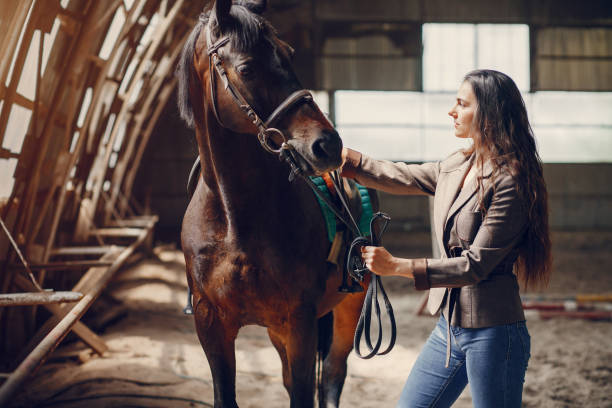 istock Beautiful woman spend time with a horse 1223326964