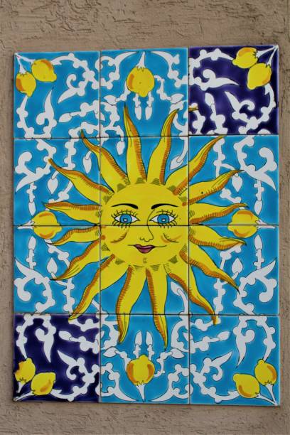 istock image of the sun painted on tile 1223327529