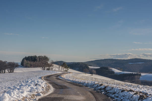istock road and many curves with snow 1223330689