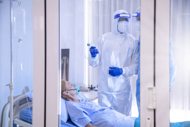 istock Medical teamwork helping to find vaccine and solution concept on Coronavirus. 1223331784