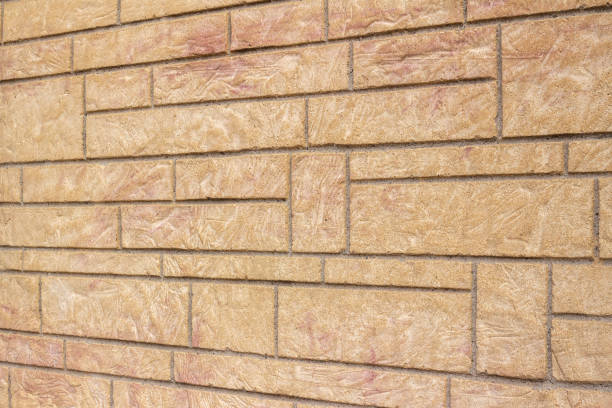 istock Vintage light brown stone brick wall texture background, with stone blocks of varying sizes and shapes. 1223331800