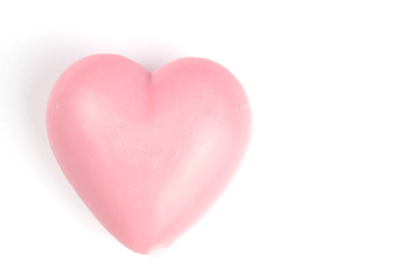 istock soap-heart pink, hand made isolated on white 1223336171