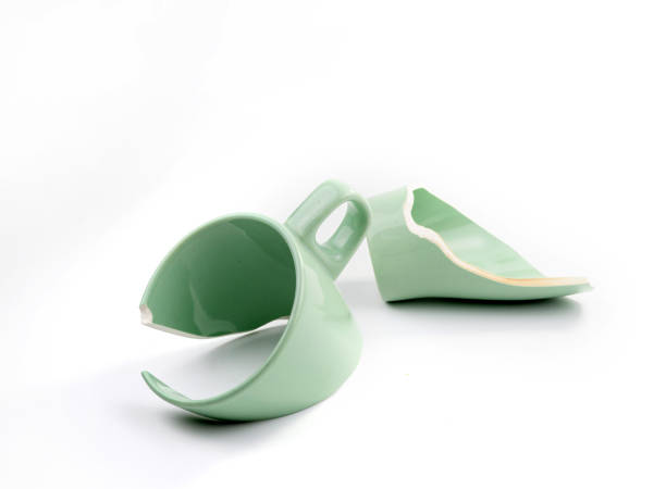 istock Broken coffee mug on white background, broken cup pieces, Broken relationship and Parting concept 1223339138