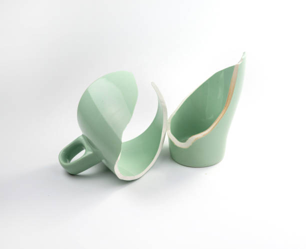 istock Broken coffee mug on white background, broken cup pieces, Broken relationship and Parting concept 1223339152