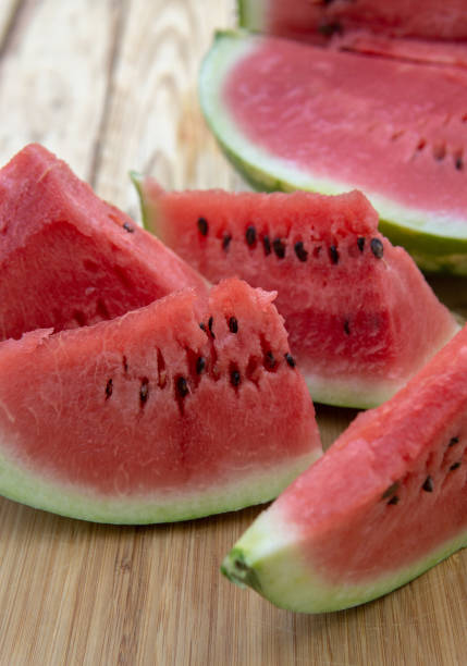 istock Fresh ripe sliced watermelon on wooden rustic background 1223339221