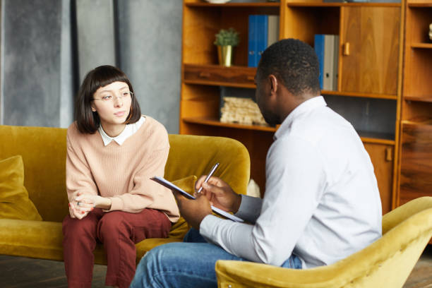 istock Woman visiting psychologist 1223339299