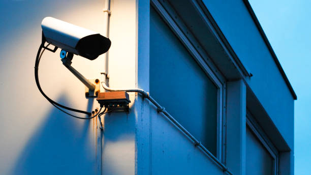 istock Security camera on the wall of an old building 1223339994