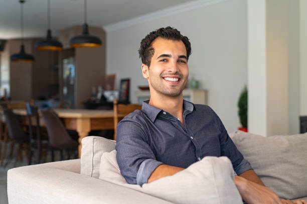 istock Happy young indian man at home 1223341968