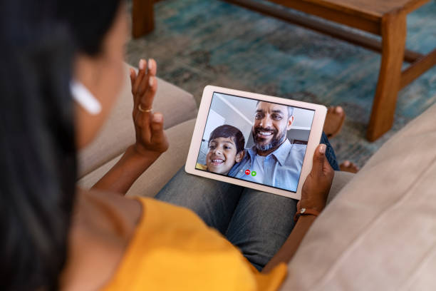 istock Woman doing video call with her family 1223342993