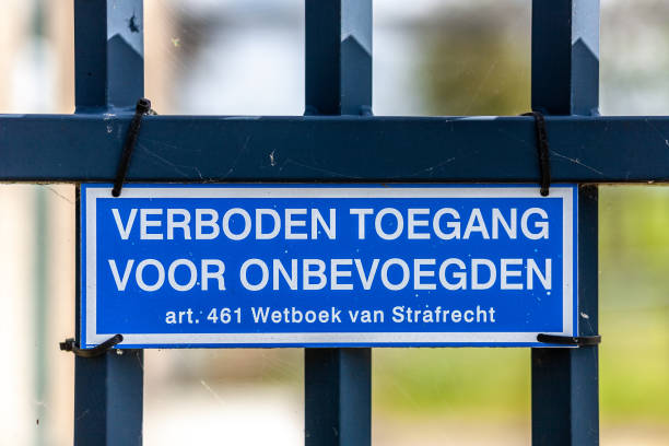 istock Sign with the Dutch text 'forbidden access for unauthorized persons' 1223343375