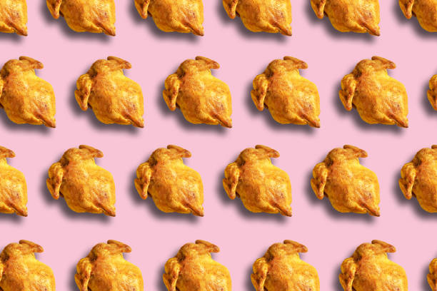 istock Colorful pattern of roasted chicken or turkey on pink background. Top view. Creative design for packaging. Food seamless pattern. Thanksgiving day concept. 1223344761