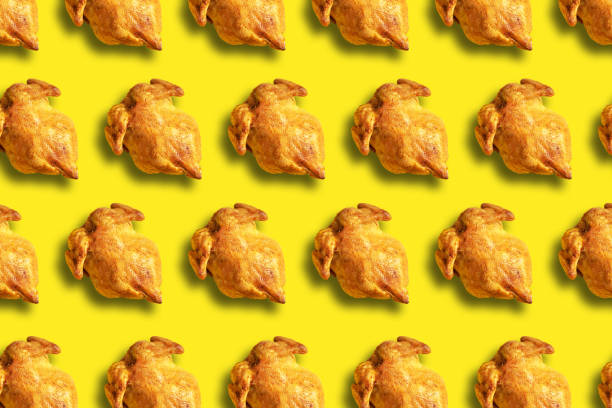 istock Colorful pattern of roasted chicken or turkey on yellow background. Top view. Creative design for packaging. Food seamless pattern. Thanksgiving day concept. 1223344767