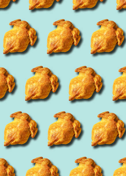 istock Colorful pattern of roasted chicken or turkey on blue background. Top view. Creative design for packaging. Food seamless pattern. Thanksgiving day concept. 1223344771