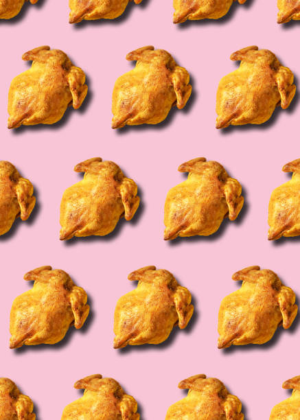 istock Colorful pattern of roasted chicken or turkey on pink background. Top view. Creative design for packaging. Food seamless pattern. Thanksgiving day concept. 1223344787