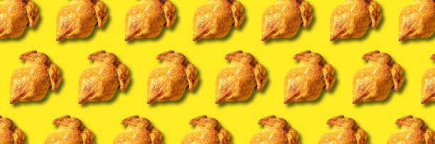 istock Colorful pattern of roasted chicken or turkey on yellow background. Top view. Creative design for packaging. Food seamless pattern. Thanksgiving day concept. 1223344790