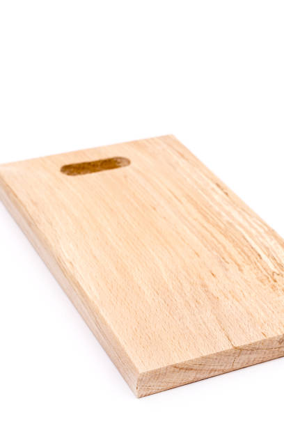 istock Kitchen wooden cutting board isolated over white 1223350058