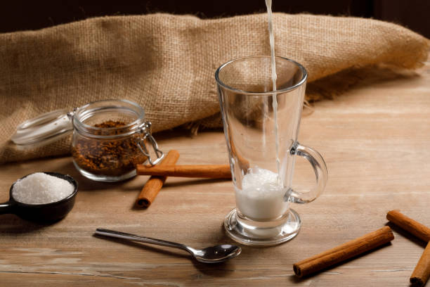 istock Cooking step by step Korean Dalgona coffee. Pour the first layer of milk and ice. Step 4 1223350066