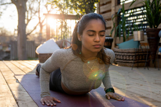 istock Beautiful Middle Eastern Female Doing Yoga in Backyard 1223350458