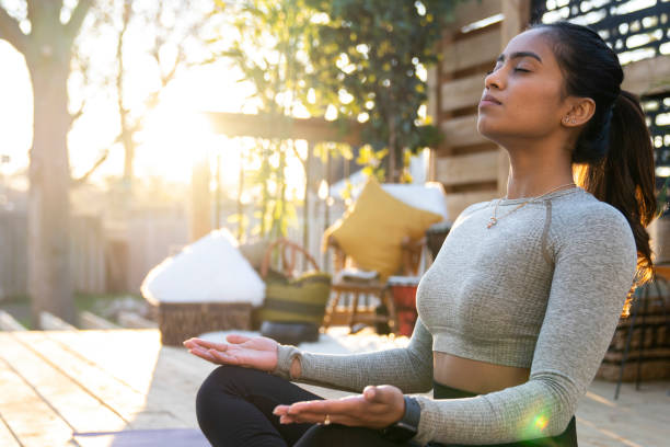 istock Beautiful Middle Eastern Female Doing Yoga in Backyard 1223350467