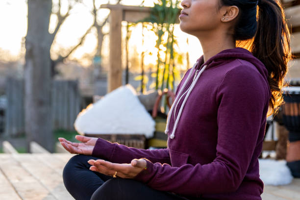 istock Beautiful Middle Eastern Female Doing Yoga in Backyard 1223350492