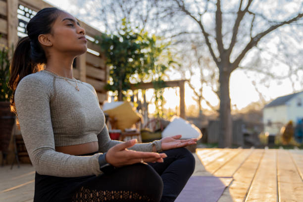 istock Beautiful Middle Eastern Female Doing Yoga in Backyard 1223350494