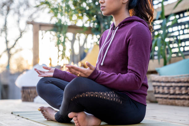istock Beautiful Middle Eastern Female Doing Yoga in Backyard 1223350513