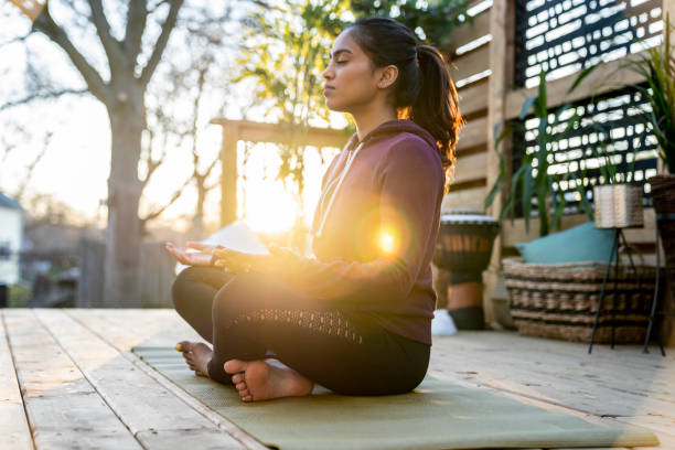 istock Beautiful Middle Eastern Female Doing Yoga in Backyard 1223350523