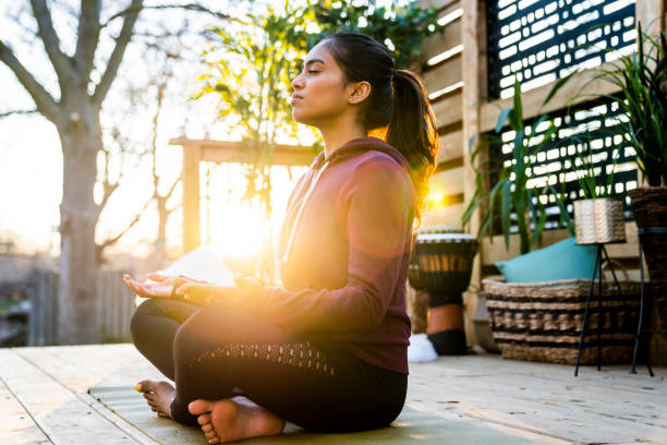 istock Beautiful Middle Eastern Female Doing Yoga in Backyard 1223350524