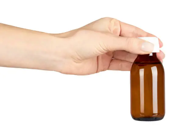 Photo of Medical glass bottle, syrup.