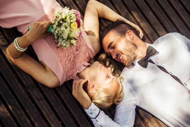 A cropped studio portrait of a dapper young man with a beautiful girl on his armhttp://195.154.178.81/DATA/shoots/ic_784009.jpg