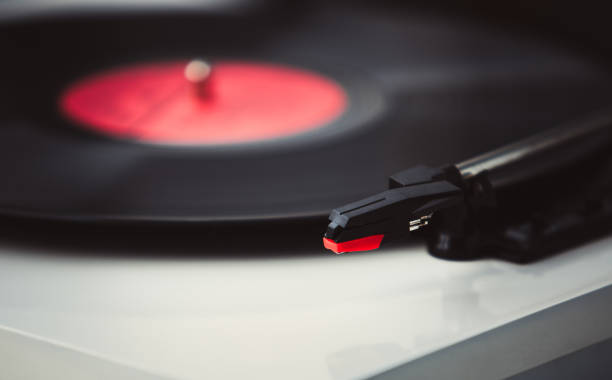 istock Retro turntable player needle.Play old vinyl records on turntables. 1223357718