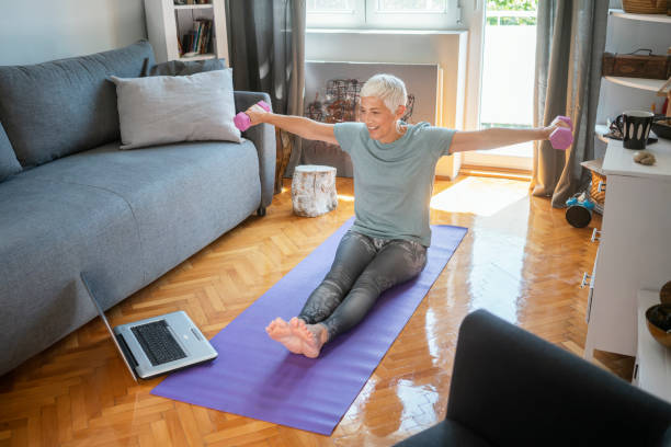 istock Mature woman exercise at home 1223358652