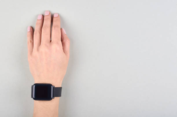 istock Black smart watches on grey background. 1223358760