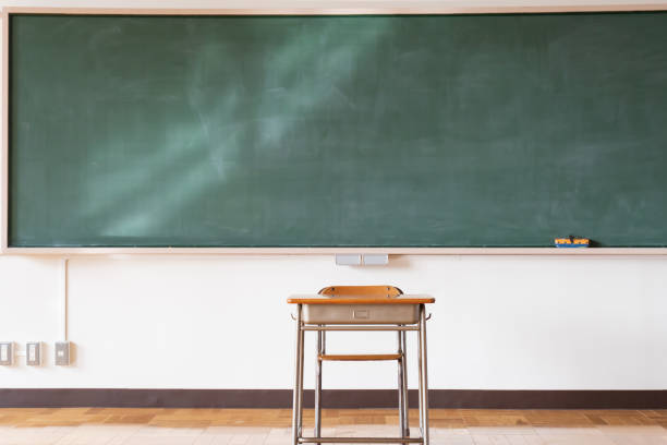 istock An image of a Japanese elementary school classroom with a blackboard and desk 1223358797