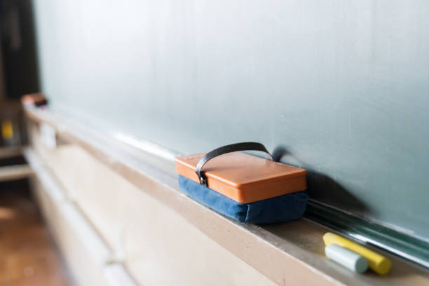 Blackboard and blackboard eraser in Japanese elementary schools Blackboard and blackboard eraser in Japanese elementary schools board eraser photos stock pictures, royalty-free photos & images