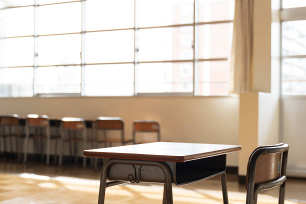 The image of a Japanese elementary school classroom and desk The image of a Japanese elementary school classroom and desk empty desk in classroom stock pictures, royalty-free photos & images