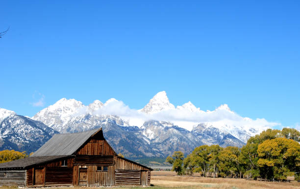 istock Barn covered Teton snowy mountain 1223359623
