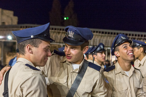 Jerusalem, May 8, 2019: Israeli soldiers talking to each other after beginning of Independence Day at Western Wall, Wailing Wall, Kotel in Jerusalem Old City
