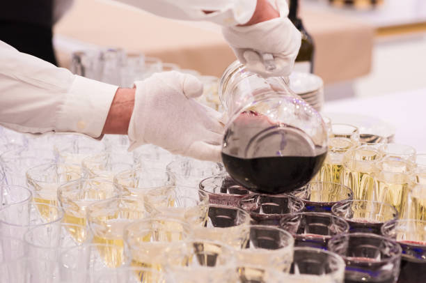 istock The man pours juice in a glass 1223363613